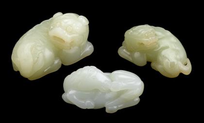 Appraisal: Three Chinese white and celadon jade carvings of animalsComprised of