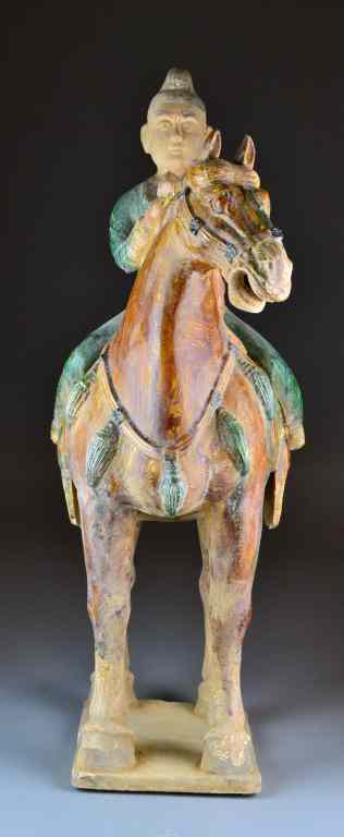 Appraisal: Chinese Tang Style Horse And RiderDepicting a standing horse with