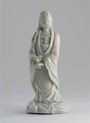 Appraisal: A Chinese blanc de Chine figure of Guanyin wearing flowing