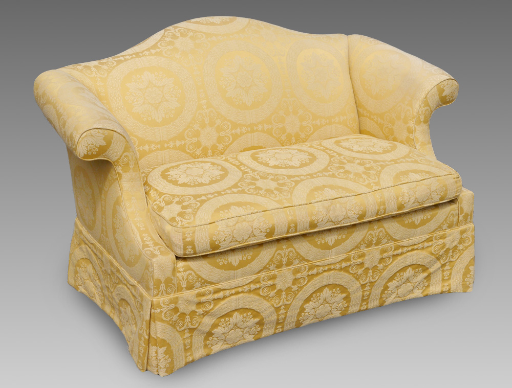 Appraisal: CHIPPENDALE STYLE SETTEE Yellow upholstery with wreath and floral designs