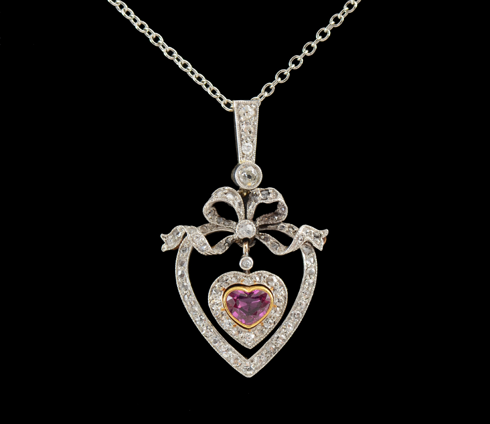 Appraisal: EDWARDIAN PLATINUM OVER K RUBY HEART PENDANT CHAIN Very rare