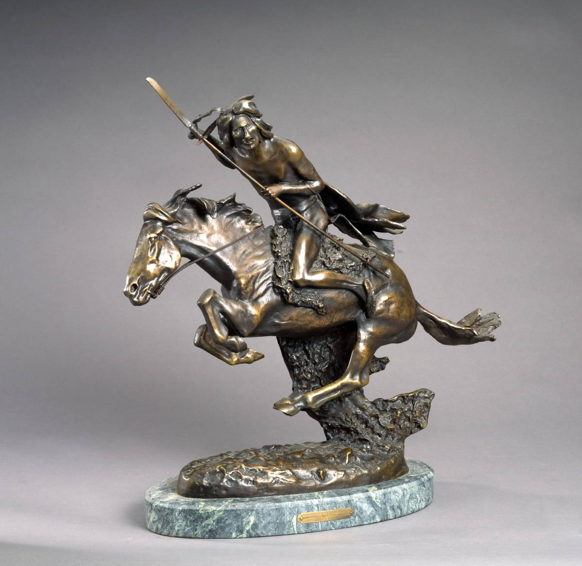 Appraisal: BRONZE FIGURE OF AN INDIAN ON HORSEBACK 'CHEYENNE ' AFTER