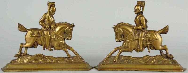 Appraisal: Pair of Brass Soldiers on Horseback Doorstops French Nice matching