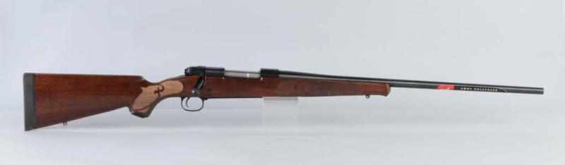 Appraisal: Winchester Model Featherweight Rifle Description win mag Bolt action Wooden