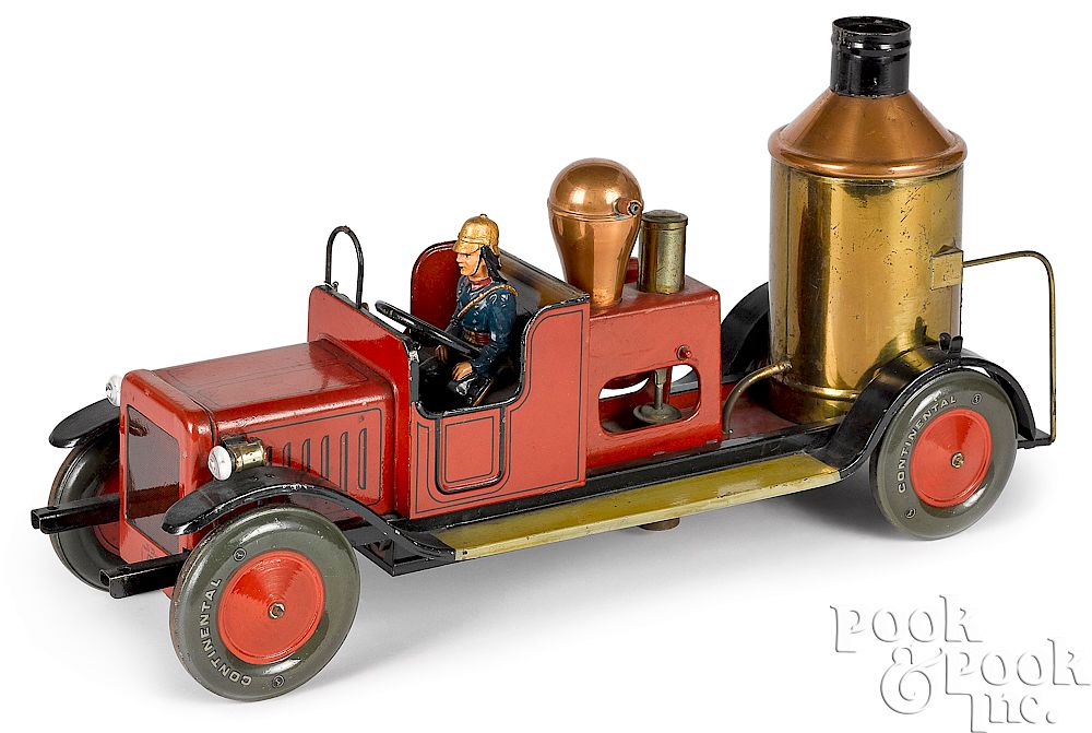 Appraisal: Bing painted tin fire pumper Bing painted tin fire pumper