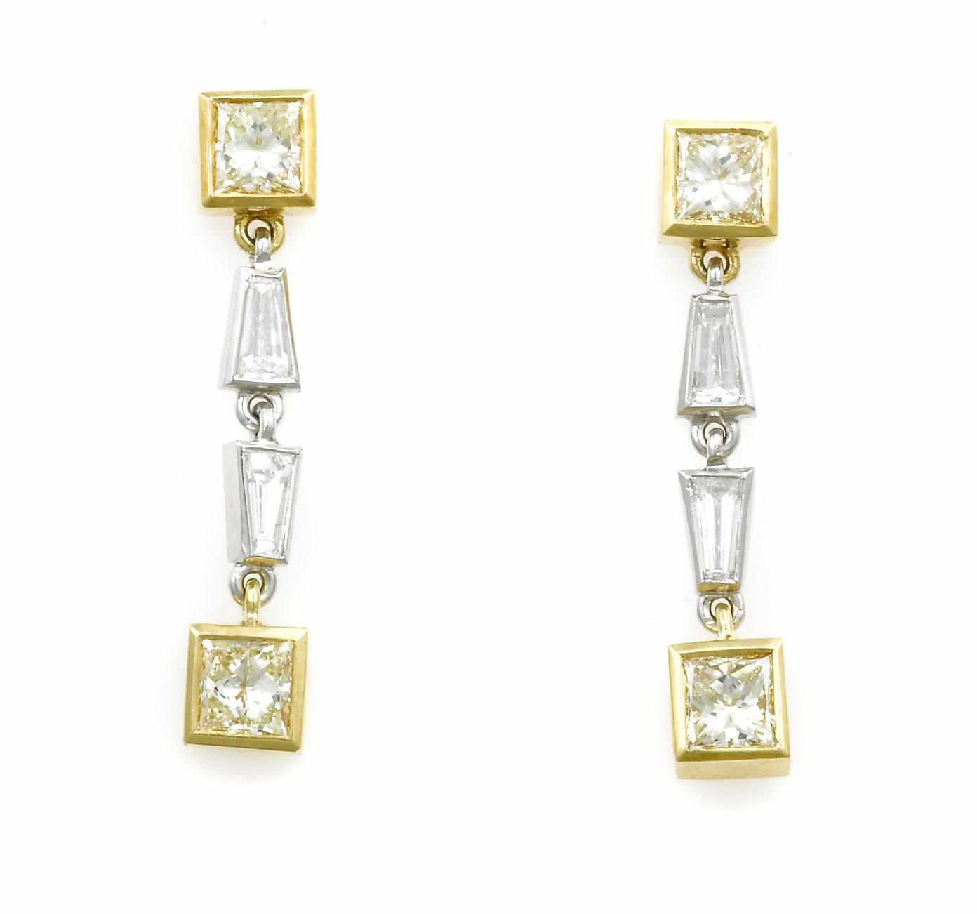 Appraisal: A pair of colored diamond and diamond earrings composed of