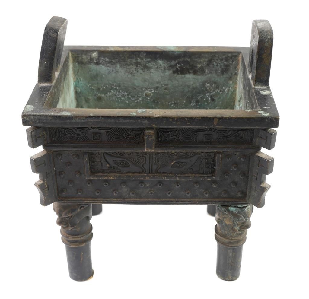 Appraisal: Handled rectangular bronze Chinese censer or ding over four dragon