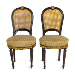 Appraisal: A Pair of Black Painted Caned and Upholstered Side Chairs