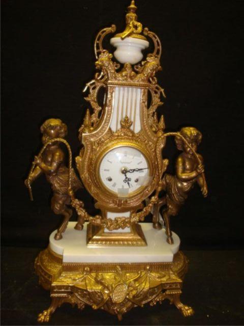 Appraisal: Gilt Metal Italian Figural Mantle Clock Imperial on face From