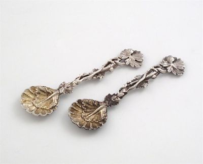 Appraisal: A pair of Victorian cast silver salt spoon by George