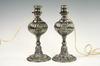 Appraisal: TABLE LAMPS - Pair of repousse silver plated table lamps