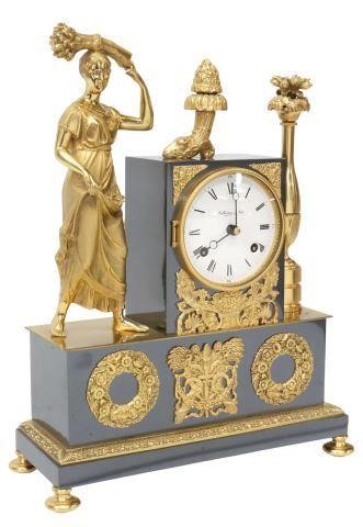 Appraisal: French Restauration style parcel gilt metal mantel clock Collection d'Art