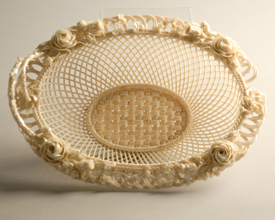 Appraisal: A Belleek Pearlware Reticulated Basket oval with applied roses and