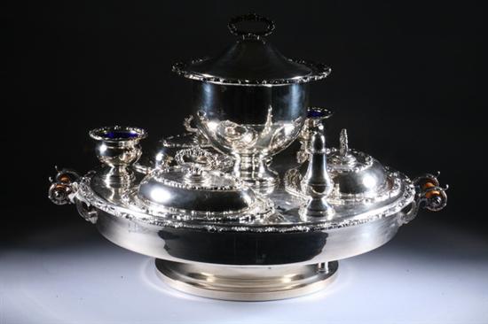 Appraisal: SILVER PLATED REVOLVING SUPPER DISH Round tray with c-scroll molded