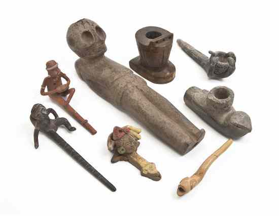 Appraisal: A Collection of Thirteen Pre-Columbian Style Pipes comprising carved stone