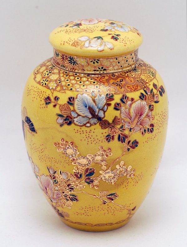 Appraisal: Satsuma covered jar Yellow glaze with floral and butterfly decoration