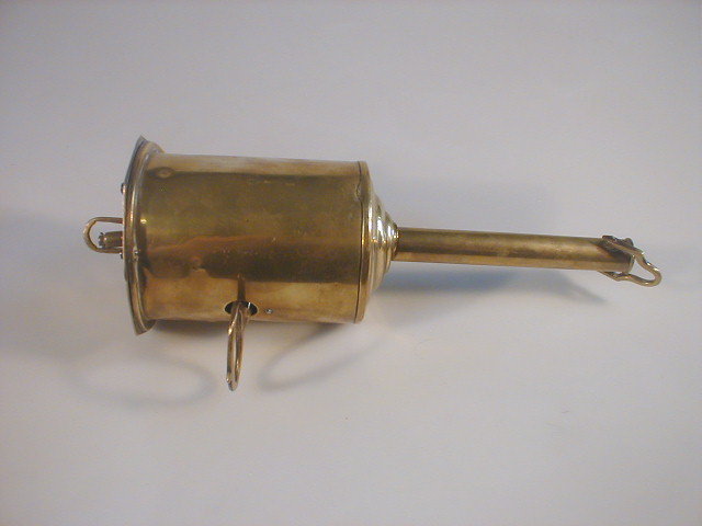 Appraisal: A Victorian brass roasting jack with key and spit