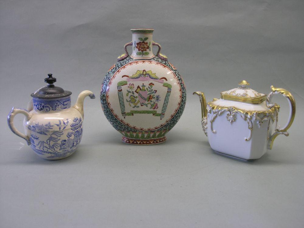 Appraisal: Royales Patent Self Pouring teapot printed with a willow pattern