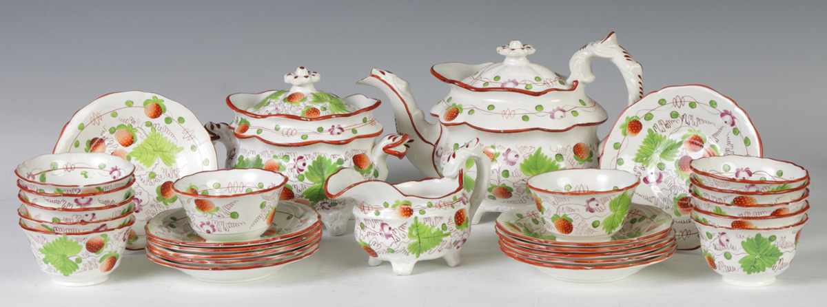 Appraisal: Strawberry Soft Paste Tea Set Early th cent Teapot sugar