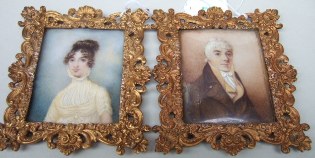 Appraisal: A pair of rectangular portrait miniatures of a lady wearing