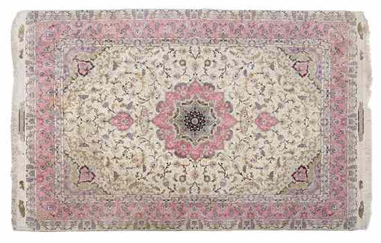 Appraisal: A Tabriz Wool Rug having a central medallion with allover