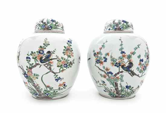 Appraisal: A Pair of Famille Verte Lidded Ginger Jars each painted