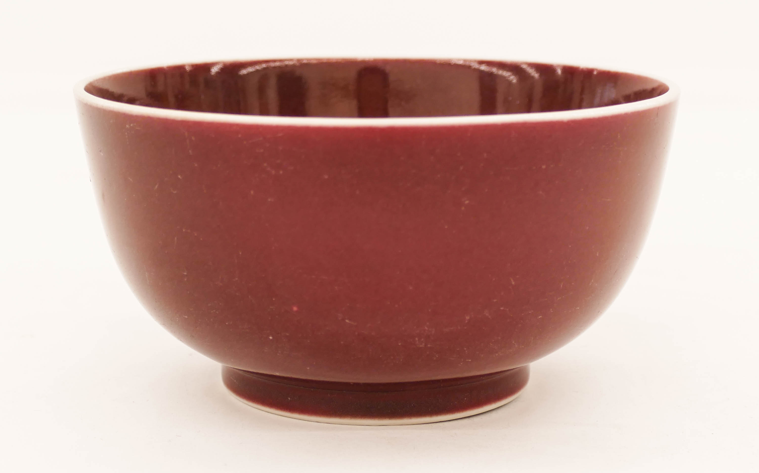 Appraisal: Chinese Qianlong Plum Glazed Bowl ''x '' A sang de