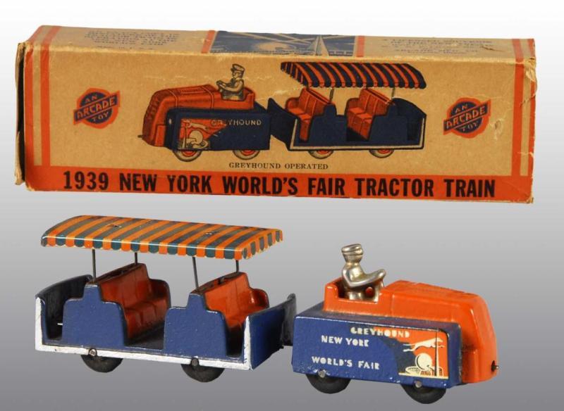 Appraisal: Cast Iron Arcade World's Fair Tractor Train Description Two pieces