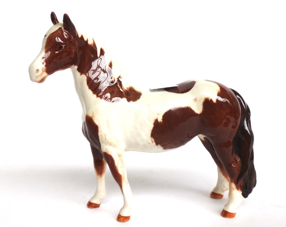 Appraisal: A Beswick skewbald pinto pony No and a piebald pinto