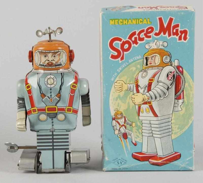 Appraisal: Tin Litho Space Man Wind-Up Toy Description Japanese Working Made