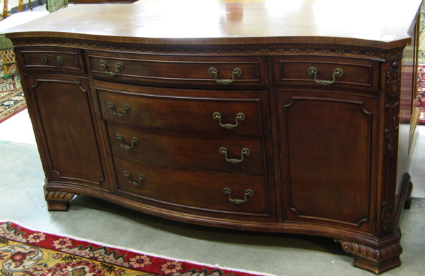 Appraisal: CHIPPENDALE STYLE MAHOGANY BUFFET American mid th century having a