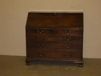 Appraisal: A GEORGE III MAHOGANY BUREAU the fall front enclosing interior