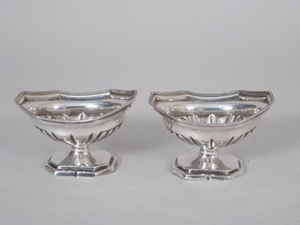 Appraisal: Pair of George III octagonal semi fluted Pedestal Salts London