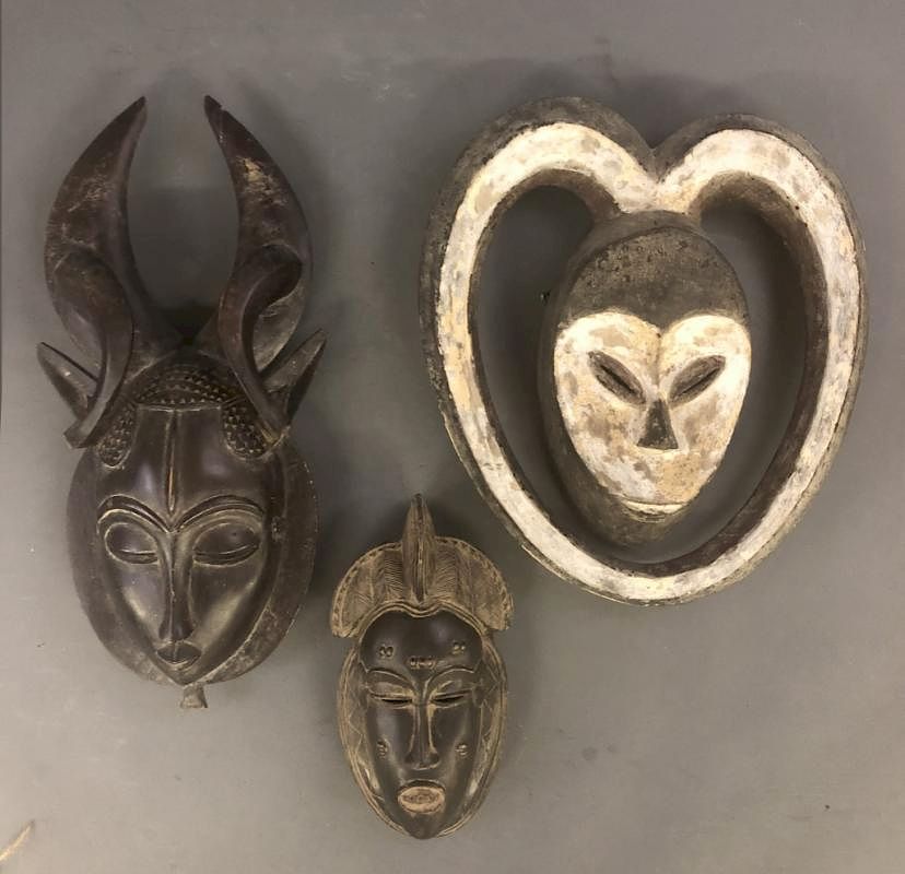 Appraisal: Three African Wood Carved Masks Three African wood carved masks