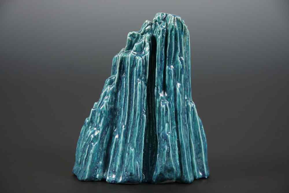 Appraisal: CHINESE PORCELAIN SCULPTURE - th c Scholar's Mountain in aqua