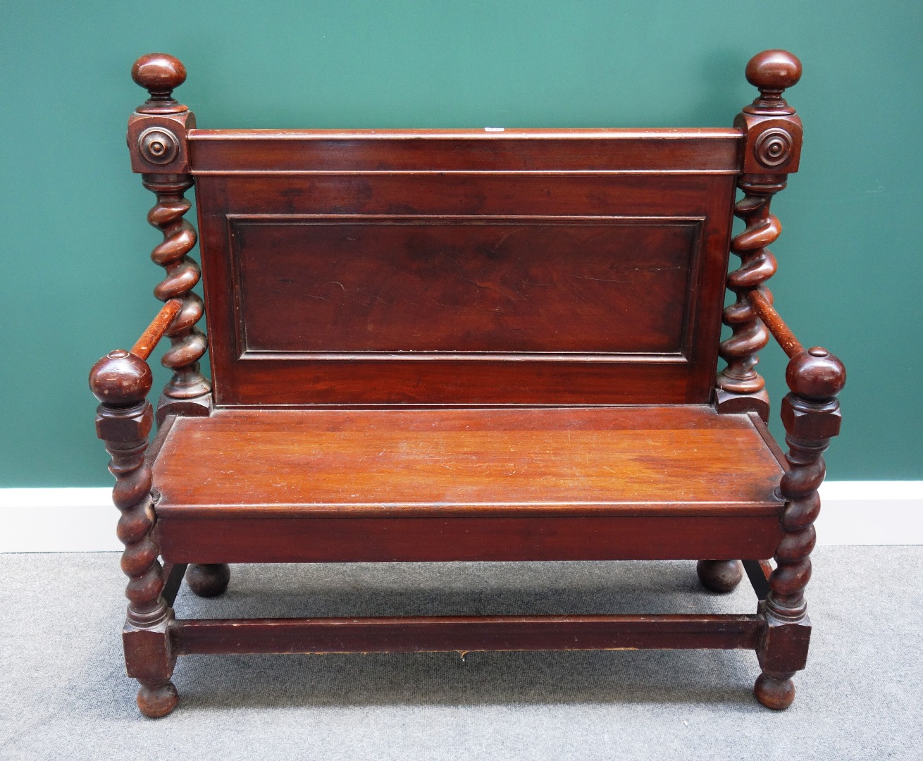 Appraisal: A made-up Victorian mahogany hall bench with barleytwist supports and