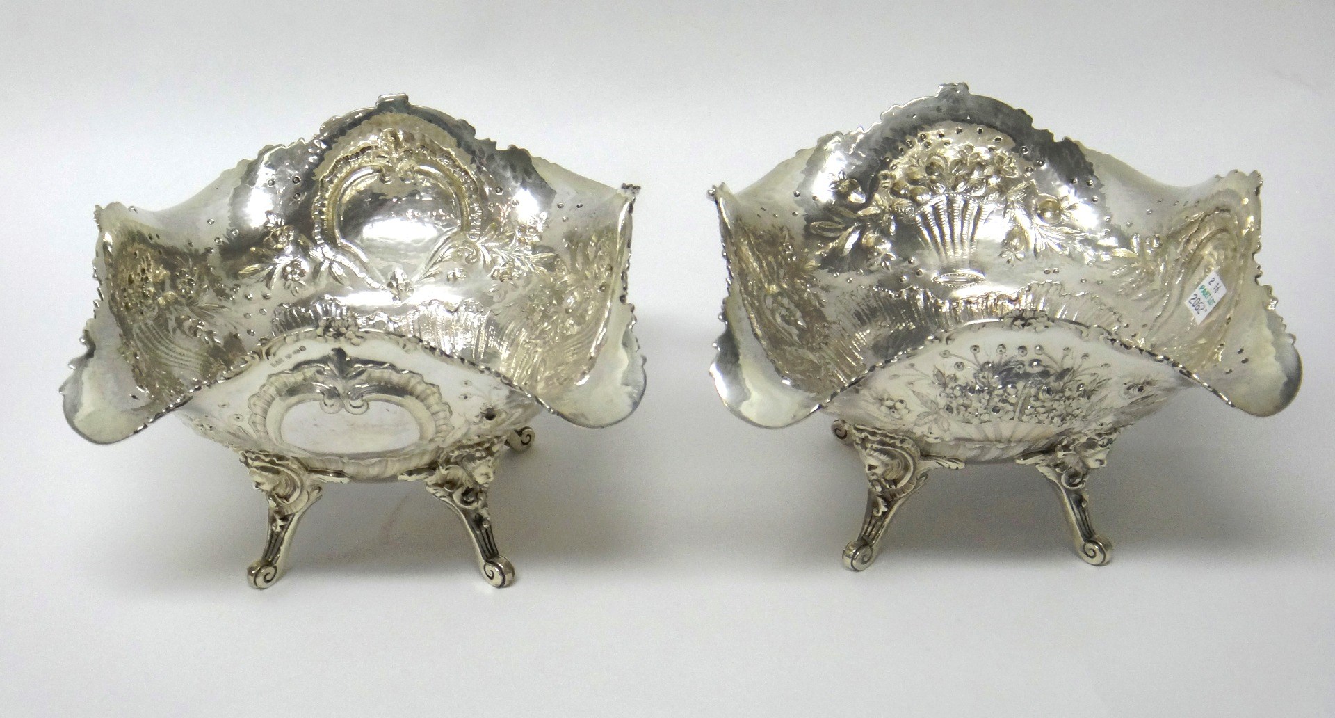 Appraisal: A pair of silver baskets of shaped square form with