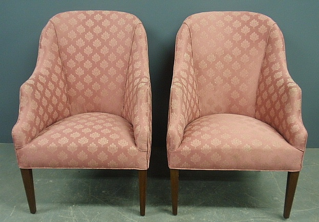 Appraisal: - Pair of mahogany lolling chairs by Southwood with rose