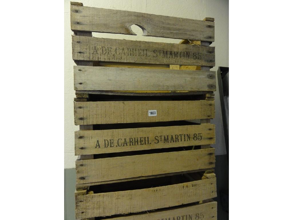 Appraisal: A stack of six timber slatted vegetable crates with lettering