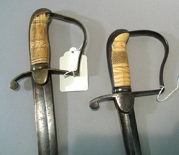 Appraisal: A lot of two American militia swordscirca - Comprising Curved