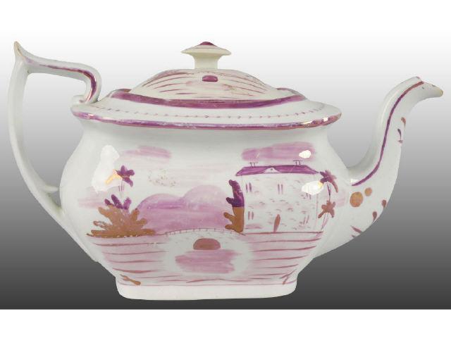 Appraisal: Early Staffordshire Pink Luster Teapot with Lid Description Crack to