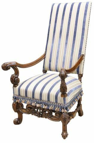 Appraisal: French carved walnut frame highback armchair th c having striped