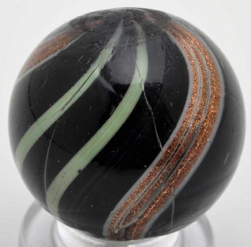 Appraisal: Maglight Banded Lutz Marble Description Appears to be black opaque