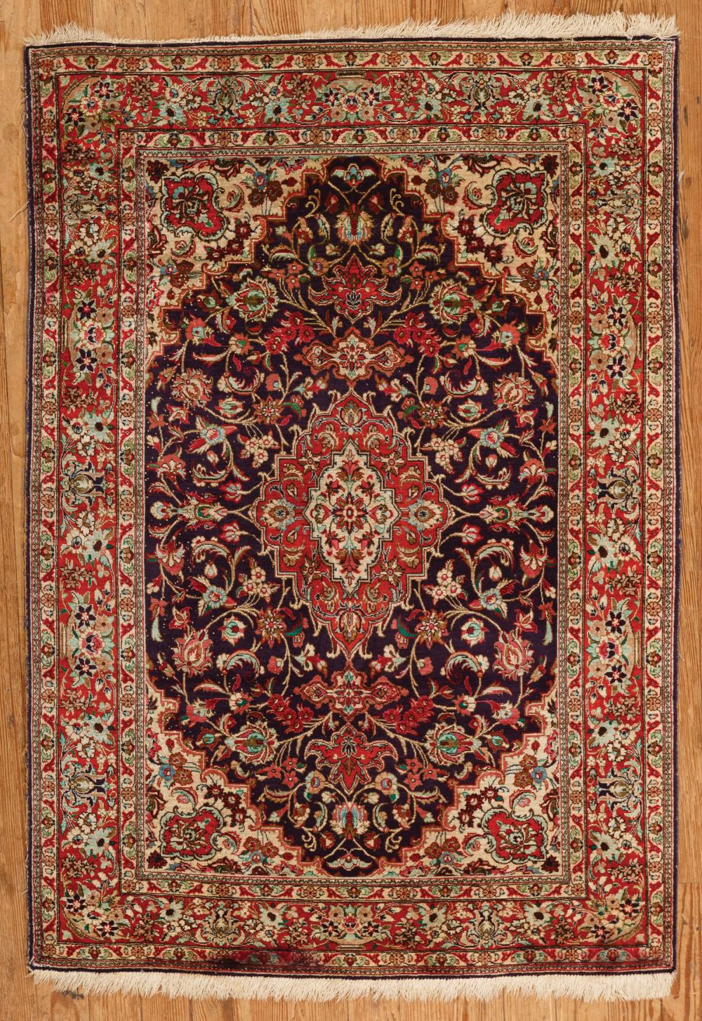 Appraisal: Persian Rug blue ground red border vining floral design ft