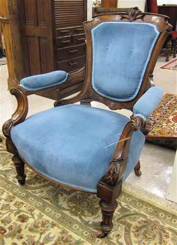 Appraisal: A VICTORIAN WALNUT ARMCHAIR Louis XVI sub style American c