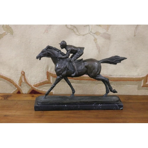 Appraisal: Milo bronze sculpture of jockey on horse on black marble