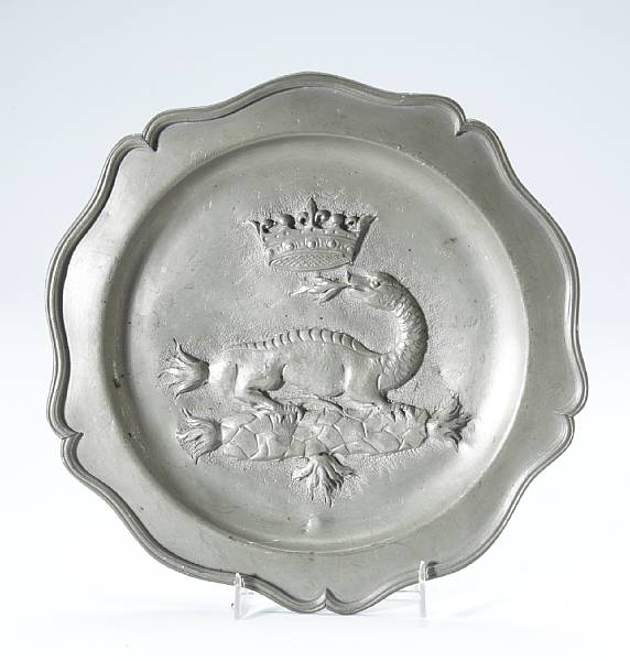 Appraisal: A pewter plate with crowned dragon decoration diameter of plate