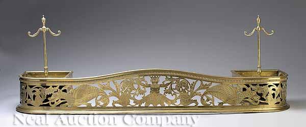 Appraisal: A Fine American Brass Fire Fender th c shaped continuous