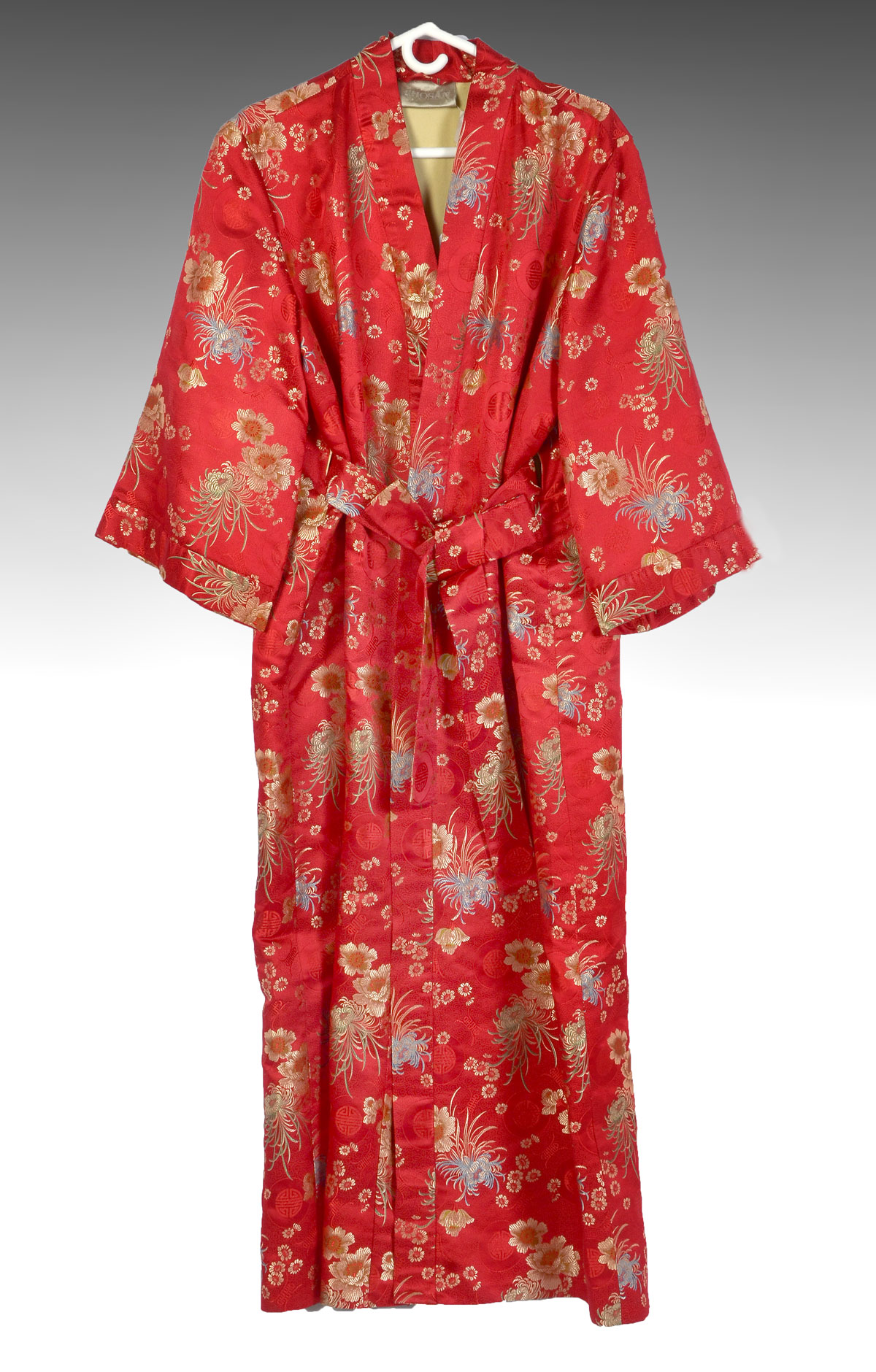 Appraisal: RED AND GOLD CHINESE ROBE Red ground Chinese silk robe