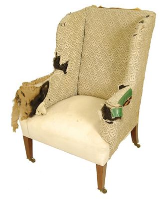 Appraisal: Howard Sons Ltd A wing armchair with original H S